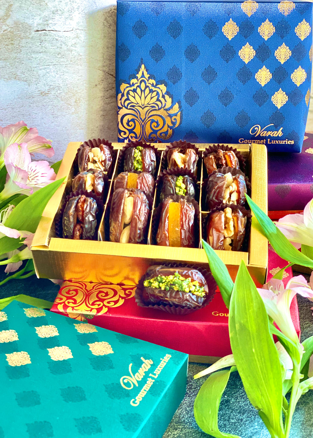 12 Premium Dates stuffed with nuts & dried fruits in a gold foiled gift box