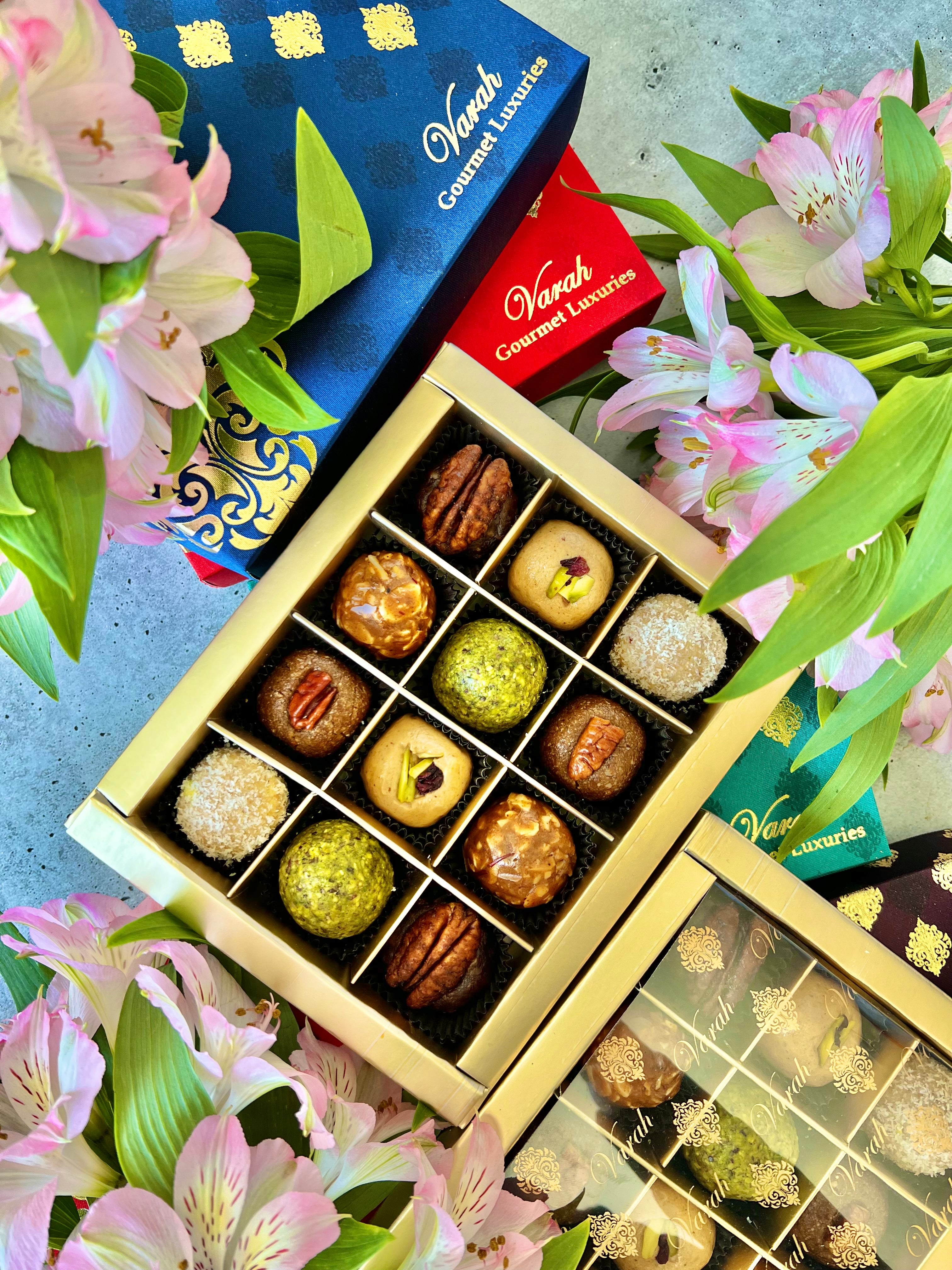 Fruit & Nut Bites in a gold foiled gift box